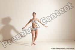 Swimsuit Gymnastic poses Woman White Moving poses Slim long brown Dynamic poses Academic